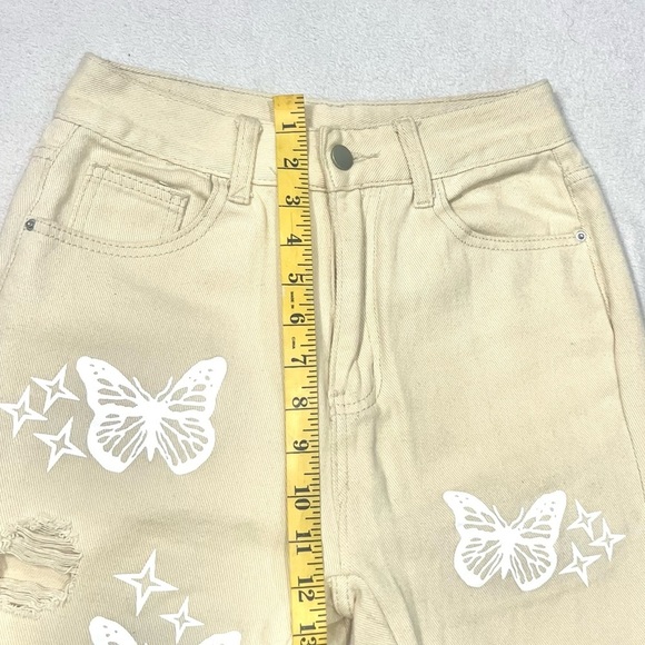SHEIN Tan Boot Cut Jeans with White Butterfly Design - Picture 6 of 7